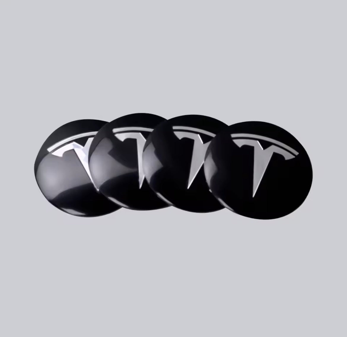 Centerklistermærker med Tesla-logo til fælge